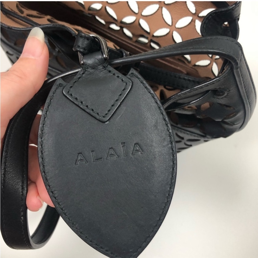 Alaia Bag Black Crossbody Leather Laser Cut Out Bucket Drawstring - Picture 11 of 15